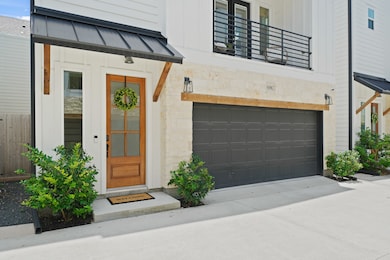 Included is a spacious two-car garage with an auto