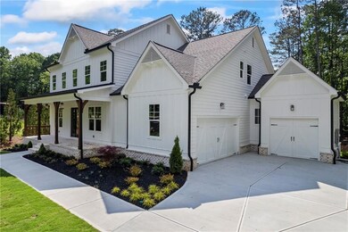 View of front of house with roof with shingles, bo