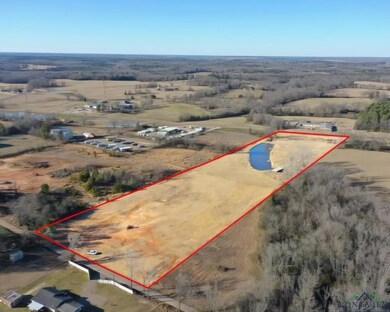 Birds eye view of property featuring a rural view