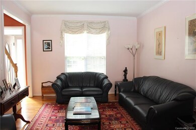 Hardwoods adorn the Formal Living Space.