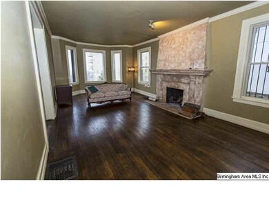 Living Room with gorgeous stone fireplace, hardwoo