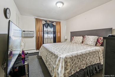 Bedroom featuring hardwood floors