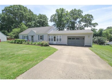 Large paved drive and attached garage for your con