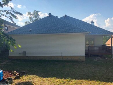 back of house with covered porch