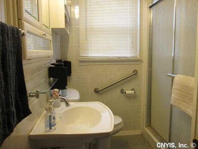 Bathroom. Updated hall bathroom - notice the tilin