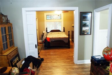 First floor bedroom with pocket doors.