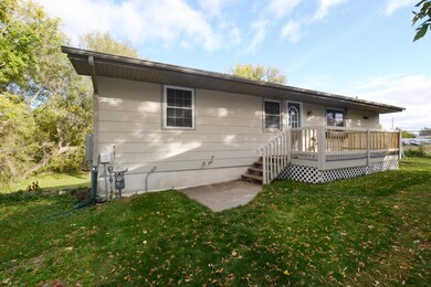 Walkout rambler on over 1 acre in town!