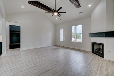 Unfurnished living room with light hardwood / wood