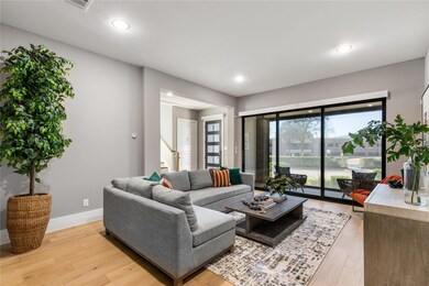 First floor living area with oversized patio doors