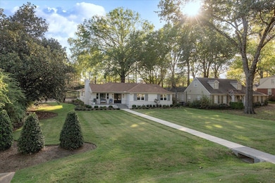 View of front of house featuring a porch and a fro