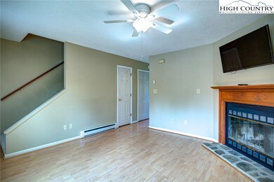 Stairs are to the left of the front door
