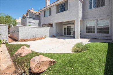 Private Yard with Covered Patio and Desert Landsca