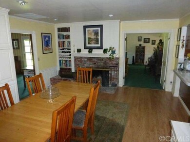 Large Formal Dining Room with Cozy Fireplace