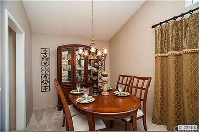 FORMAL DINING ROOM IS NEXT TO THE LIVING ROOM