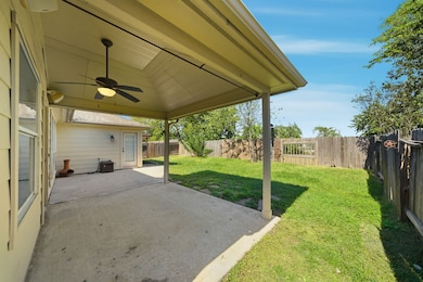 Backyard features a large covered patio - perfect for relaxation or outdoor​​‌​​​​‌​​‌‌​​​‌​​‌‌​‌‌‌​​‌‌​‌‌‌​‌​​​‌‌​ dining.