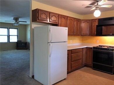 View of living room from kitchen area.