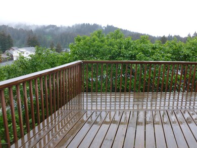 Deck views of Island Lake and Pillar mtn