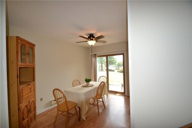 Dining area with slider leading out to patio