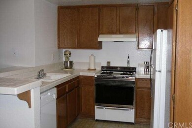 Kitchen with Gas Range, Built-in Dishwasher and Re