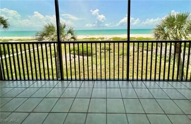 TOP Floor Balcony featuring view of water and beac
