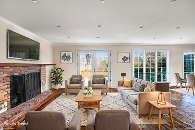 Oversized family room with reading nook and French