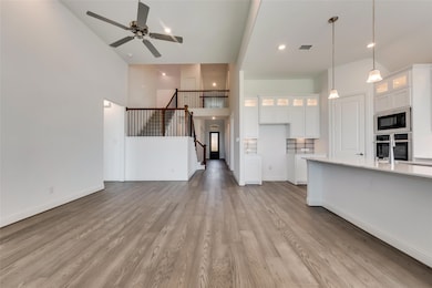 Kitchen featuring light hardwood / wood-style floo