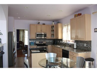 Upgraded kitchen  with granite counter tops and st