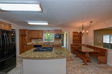 Nicely sized kitchen opens to both the family room