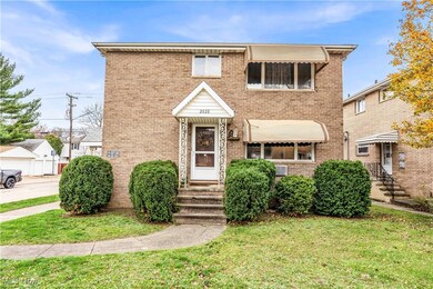 View of front of property featuring a front lawn