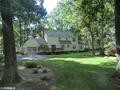 Exterior Back - Large Wonderfully Landscaped Lot.