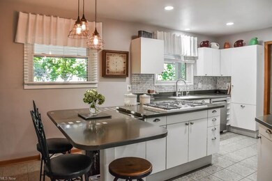 Fully applianced kitchen with a unique island, sea