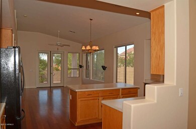 VIEW OF KITCHEN & FAMILY ROOM