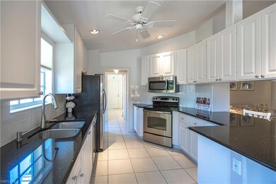 Black quartz Counters and updated Stainless Applia