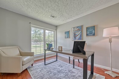 Home office tucked off at the front of the house is great for remote workers