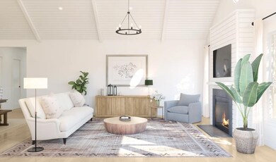 Great room with white painted ceiling beams