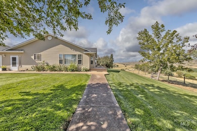 View of front of house featuring a front lawn