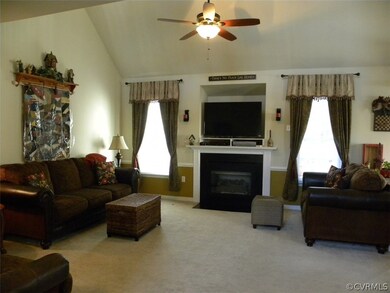 Great Room with vaulted ceiling, gas fireplace, ce
