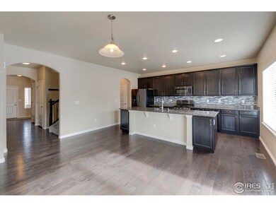 kitchen opens to butler pantry and dining room