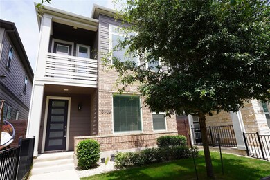 Multi unit property featuring brick siding and a 