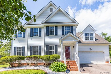FRONT ELEVATION, PAVED DRIVEWAY, MAINTENANCE FREE