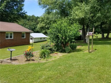 Lots of nice landscaping, flowers and plants throughout the property