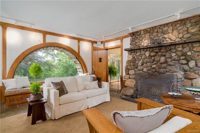 Living room with slate floor and incredible stone 