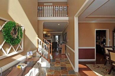 The front door welcomes you into a lovely entryway