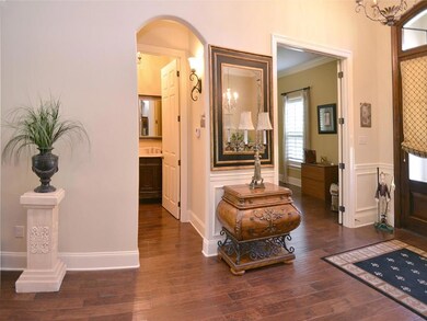 Welcoming foyer with 12' ceilings, engineered hick