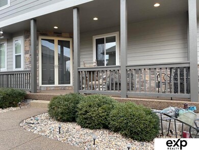 Lustrous stone walkway & porch.