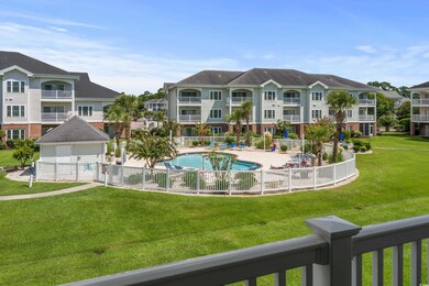 View of swimming pool featuring a yard