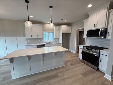 311 Mulberry Dr, Raymore, MO 64083 - photo 5