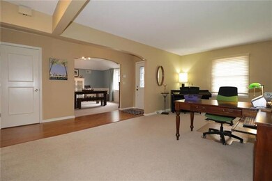 Living Room Open to Entry Hall & Dining Room Beyon