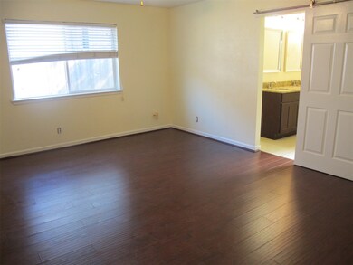 MASTER BEDROOM TO BATH VIEW. Master bedroom is on left side of home off the front entry. The other 3 bedrooms are on the right side of the home