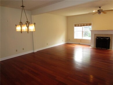 Open Concept Dining Room/Living Room with gleaming